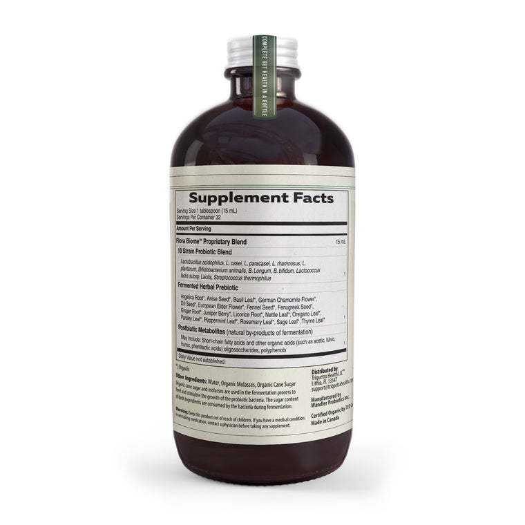 Triquetra Flora Biome liquid probiotic bottle showing supplement facts label with probiotic strains prebiotics and postbiotics