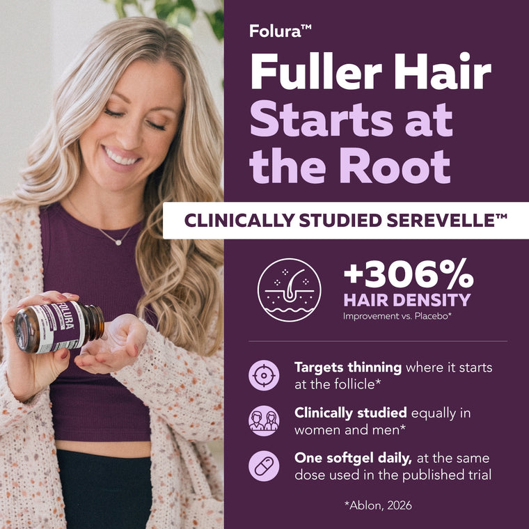 Woman holding Folura saw palmetto softgel bottle, taking one softgel daily in a bright everyday setting